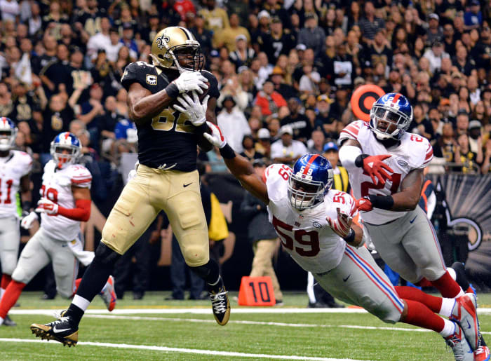 Former New Orleans Saints TE Ben Watson (82) catches a touchdown pass from QB Drew Brees in a 2015 victory against the Giants. Credit: New York Times